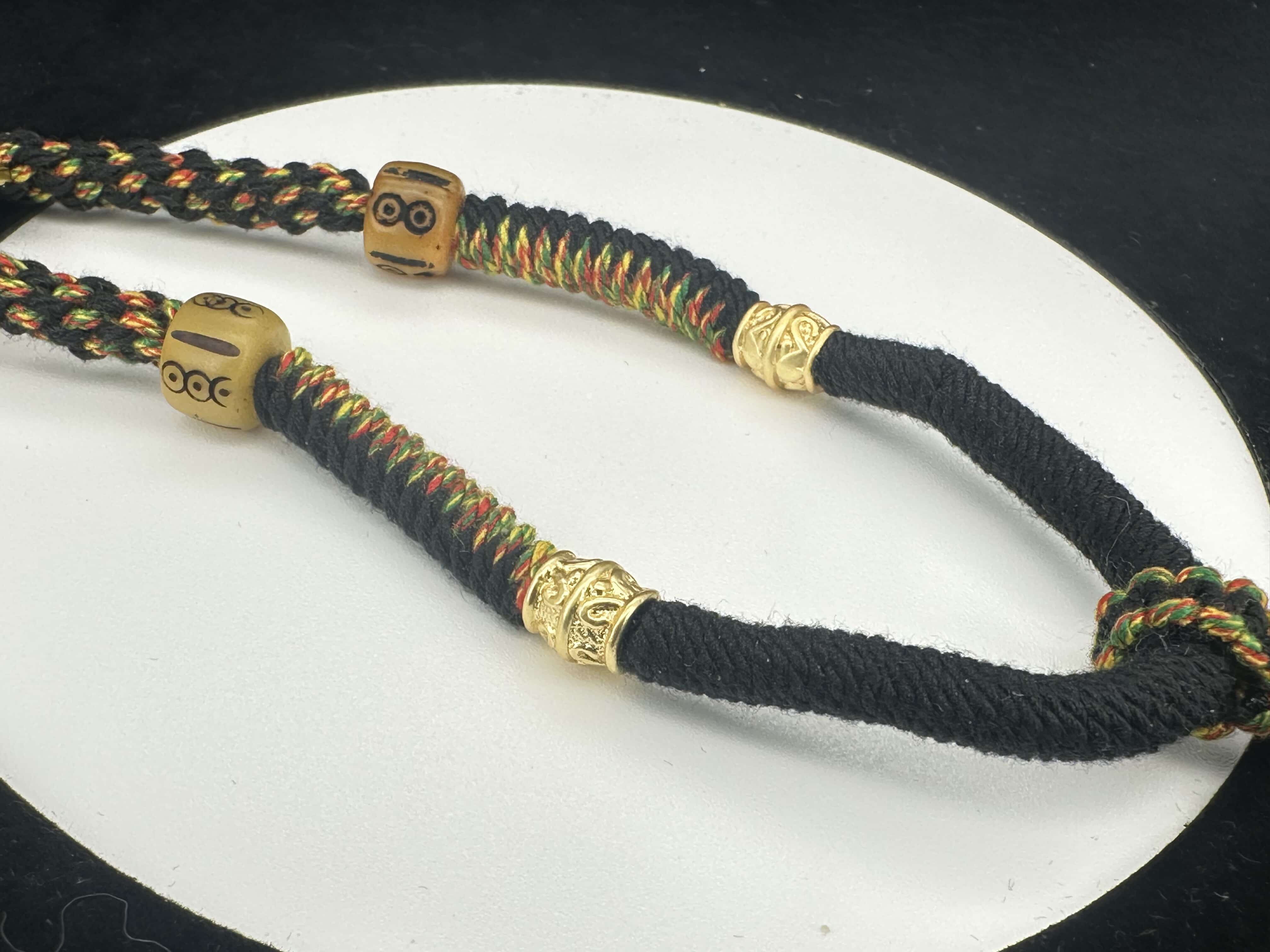 Hand wolven necklace with vintage nine eyed DZI bead