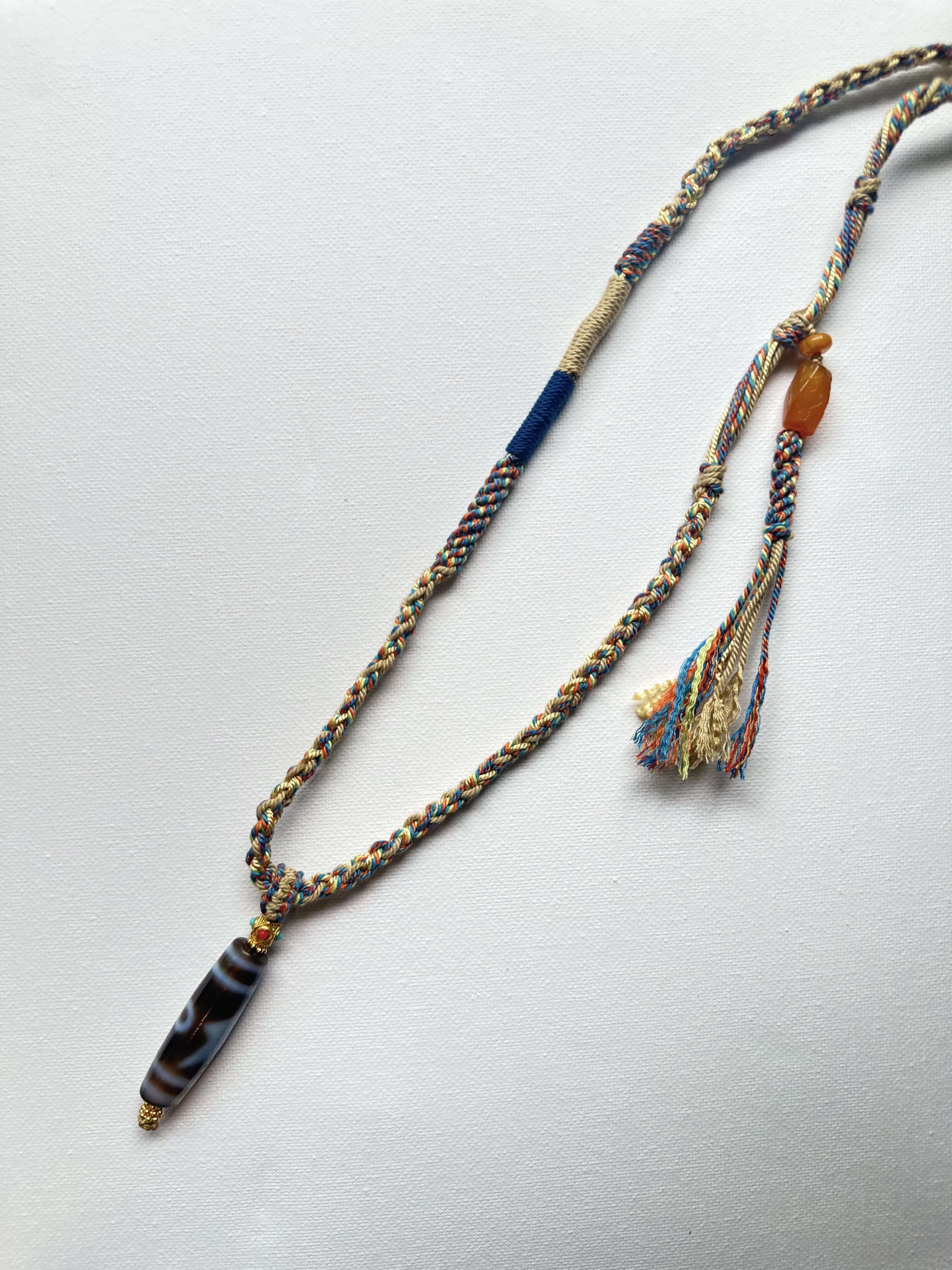 Heavily Handwoven necklace with Thunder flash Five-eyed DZI bead