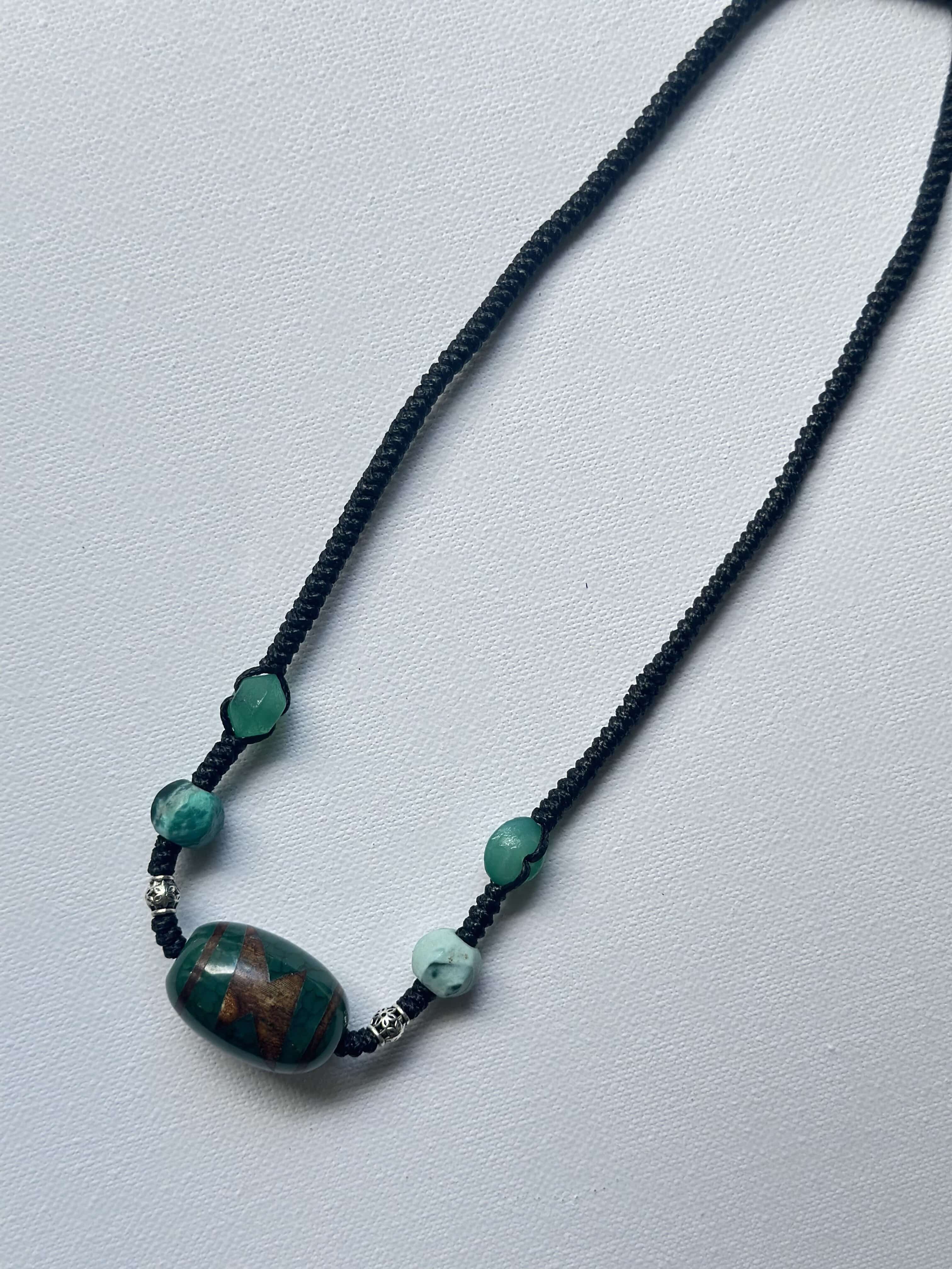 Handwoven necklace with green agate and Vintage Three-Eyed Dzi bead