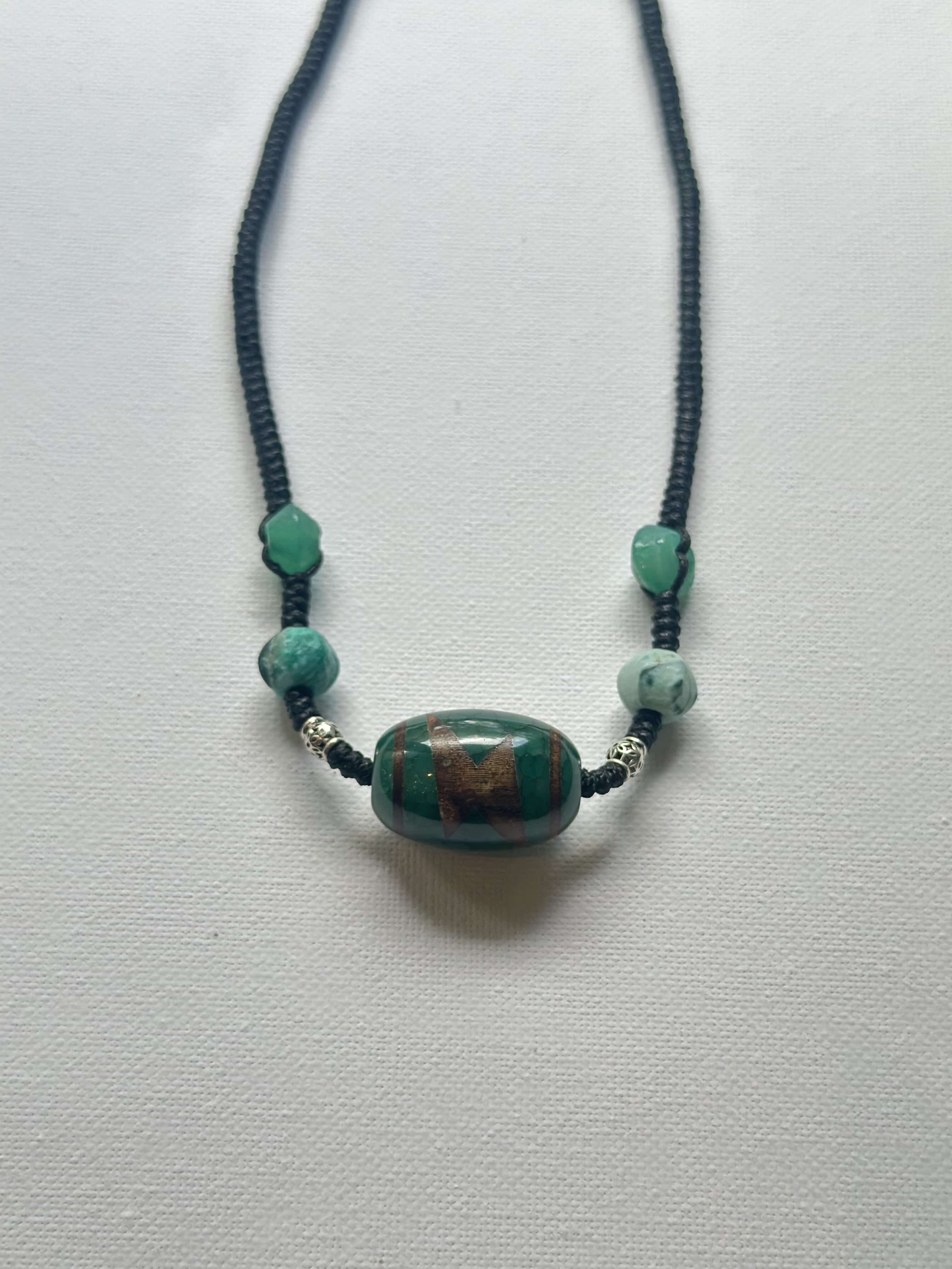 Handwoven necklace with green agate and Vintage Three-Eyed Dzi bead