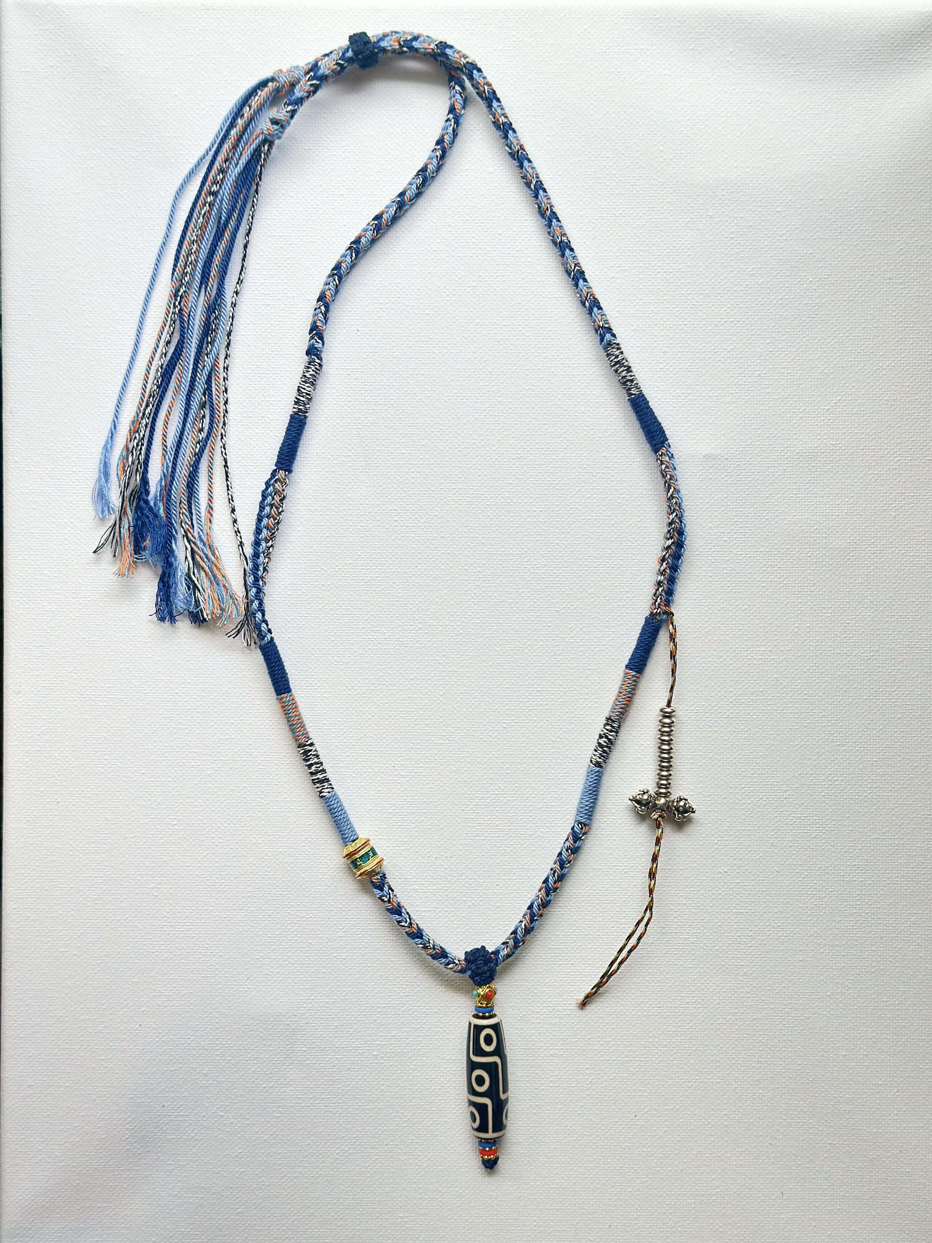 Heavily Handwoven Necklace with metal accessories and Nine-Eyed DZI pendan