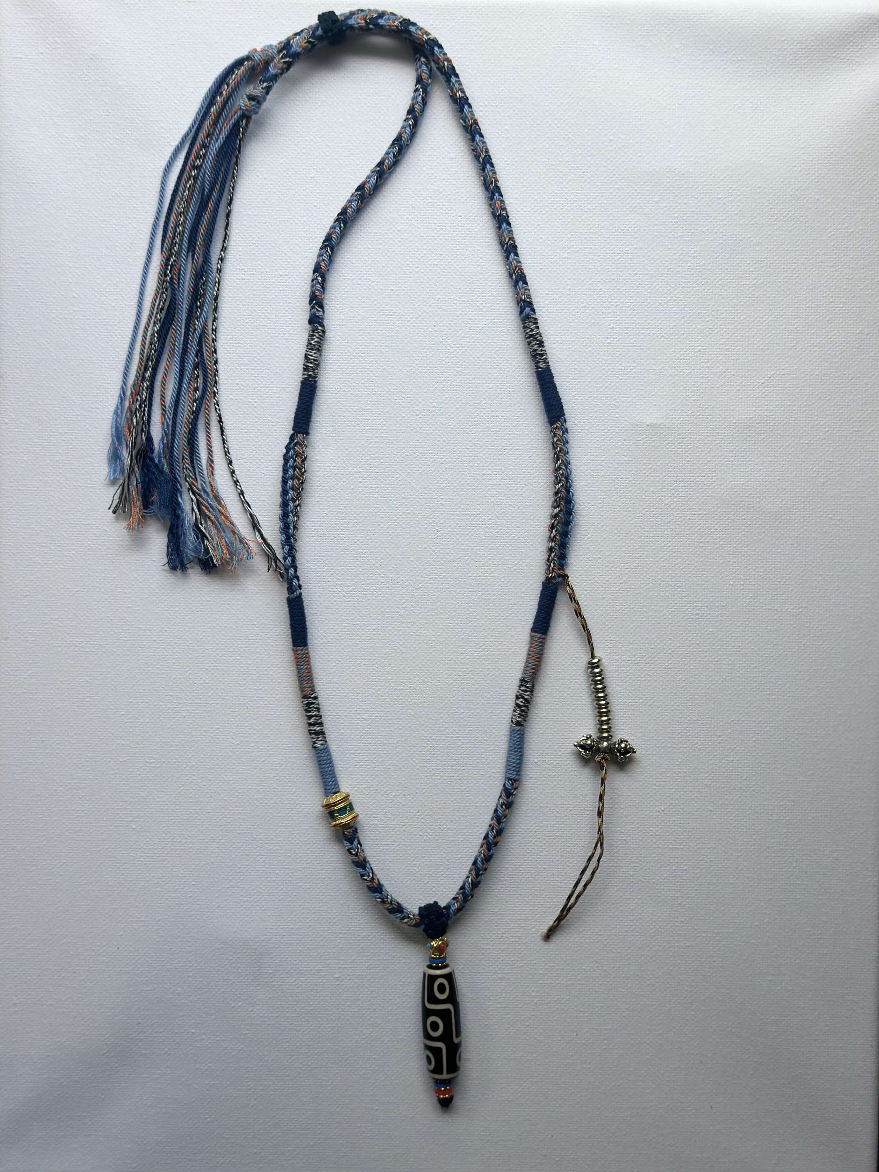 Heavily Handwoven Necklace with metal accessories and Nine-Eyed DZI pendan