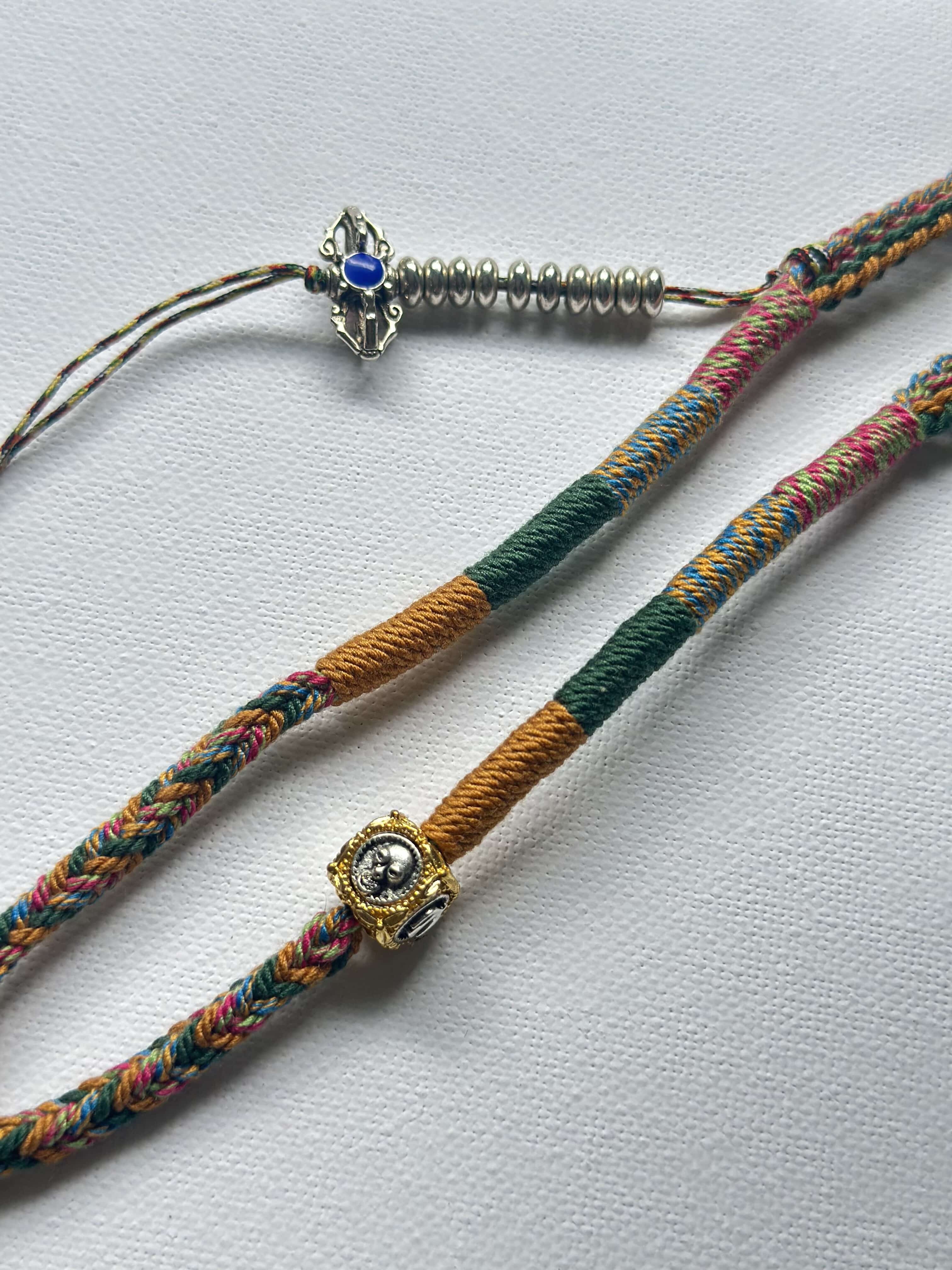 Heavily Handwoven Necklace with metal accessories and Nine-Eyed DZI pendant