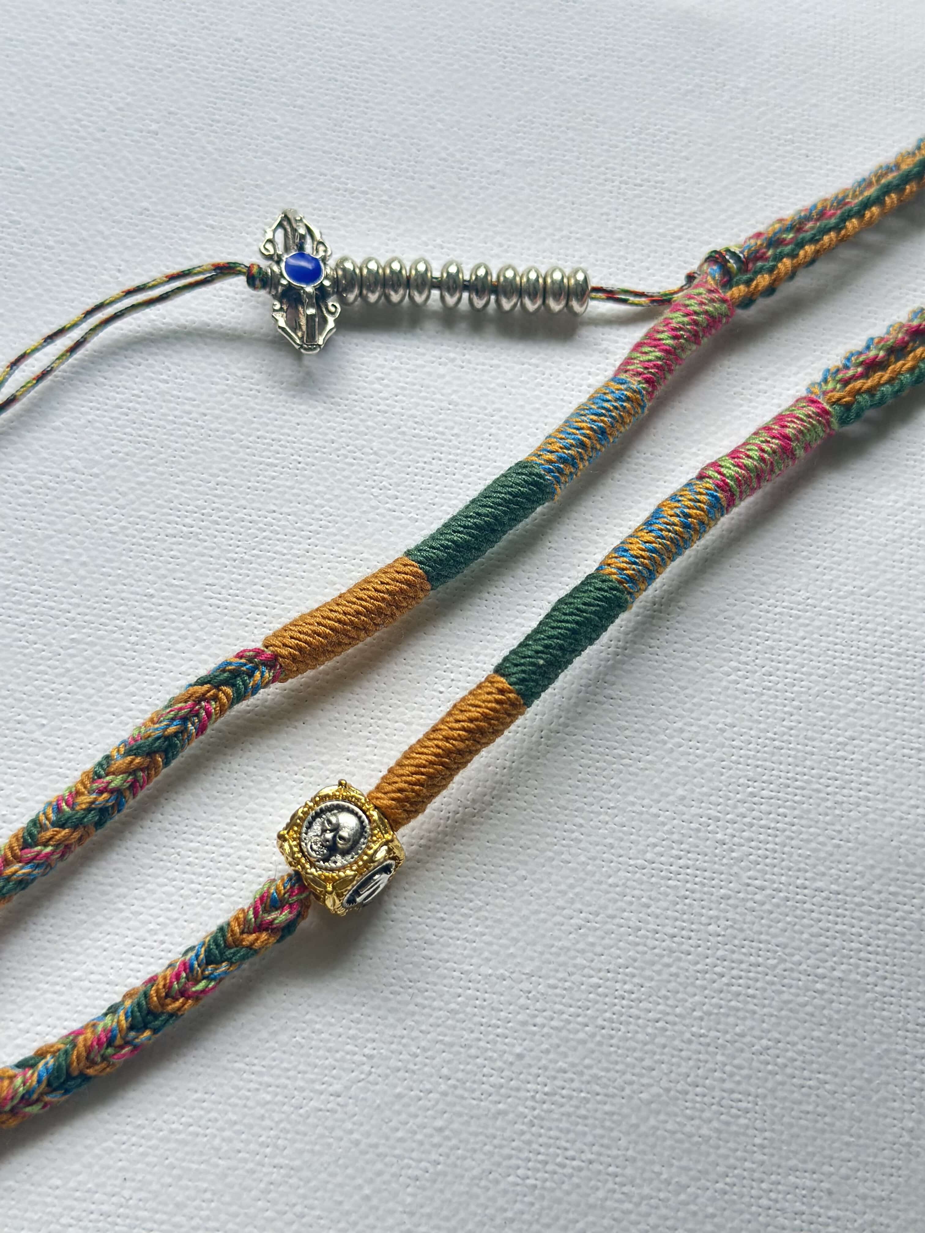 Heavily Handwoven Necklace with metal accessories and Nine-Eyed DZI pendant