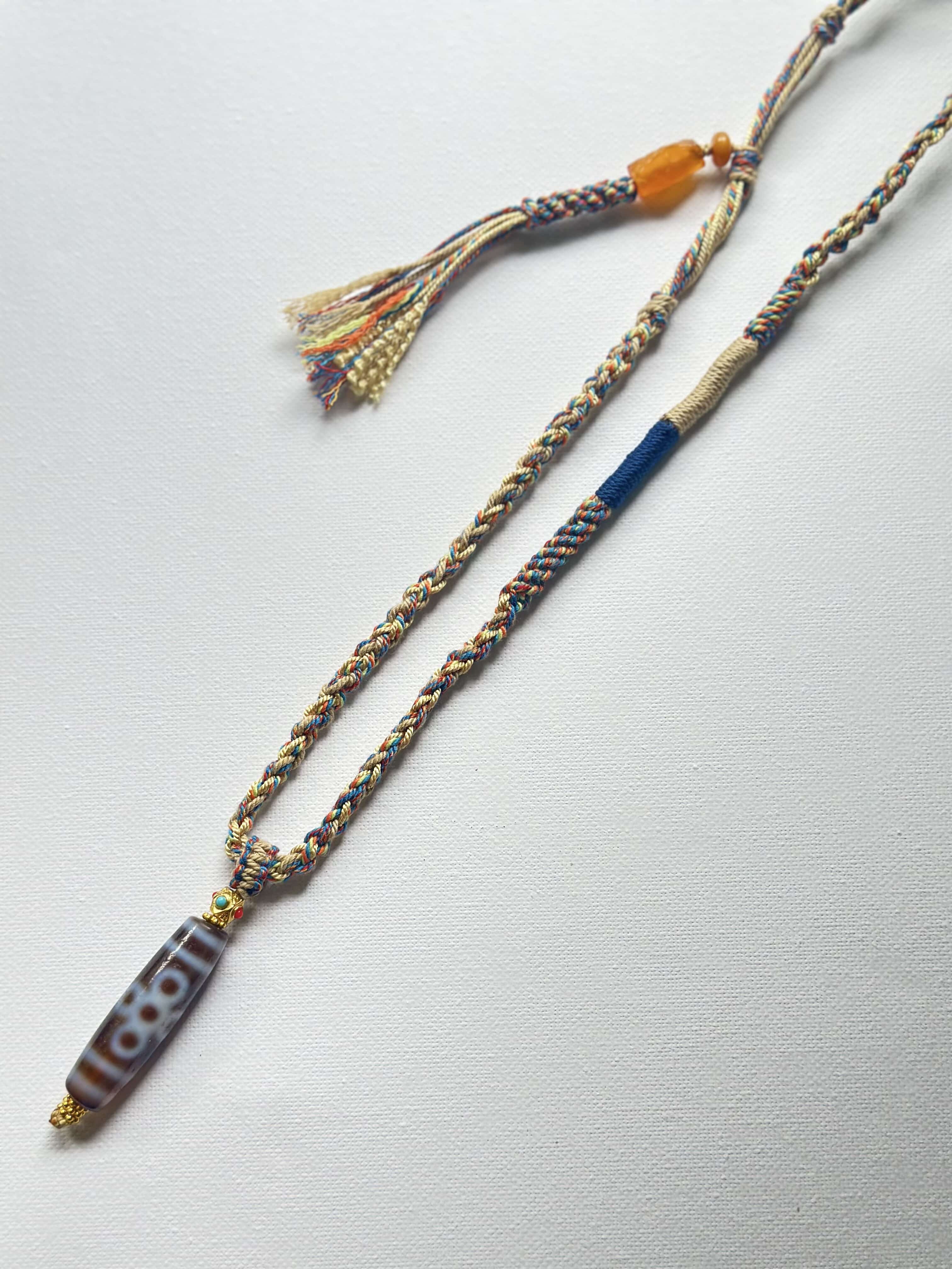 Heavily Handwoven necklace with Thunder flash Five-eyed DZI bead