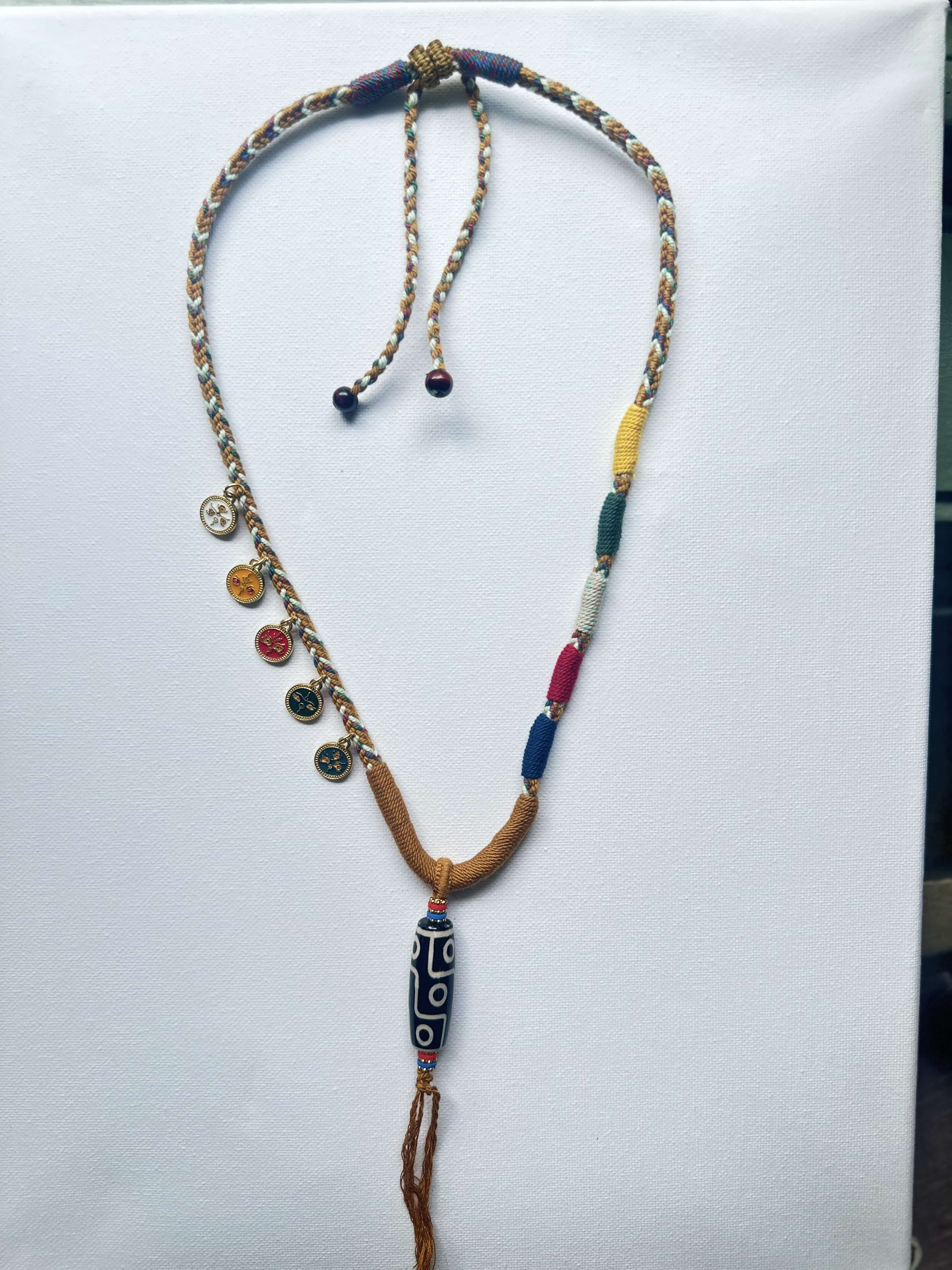 Heavily Handwoven Necklace with five metal lucky color plates and agate Nine-eyed DZI bead.