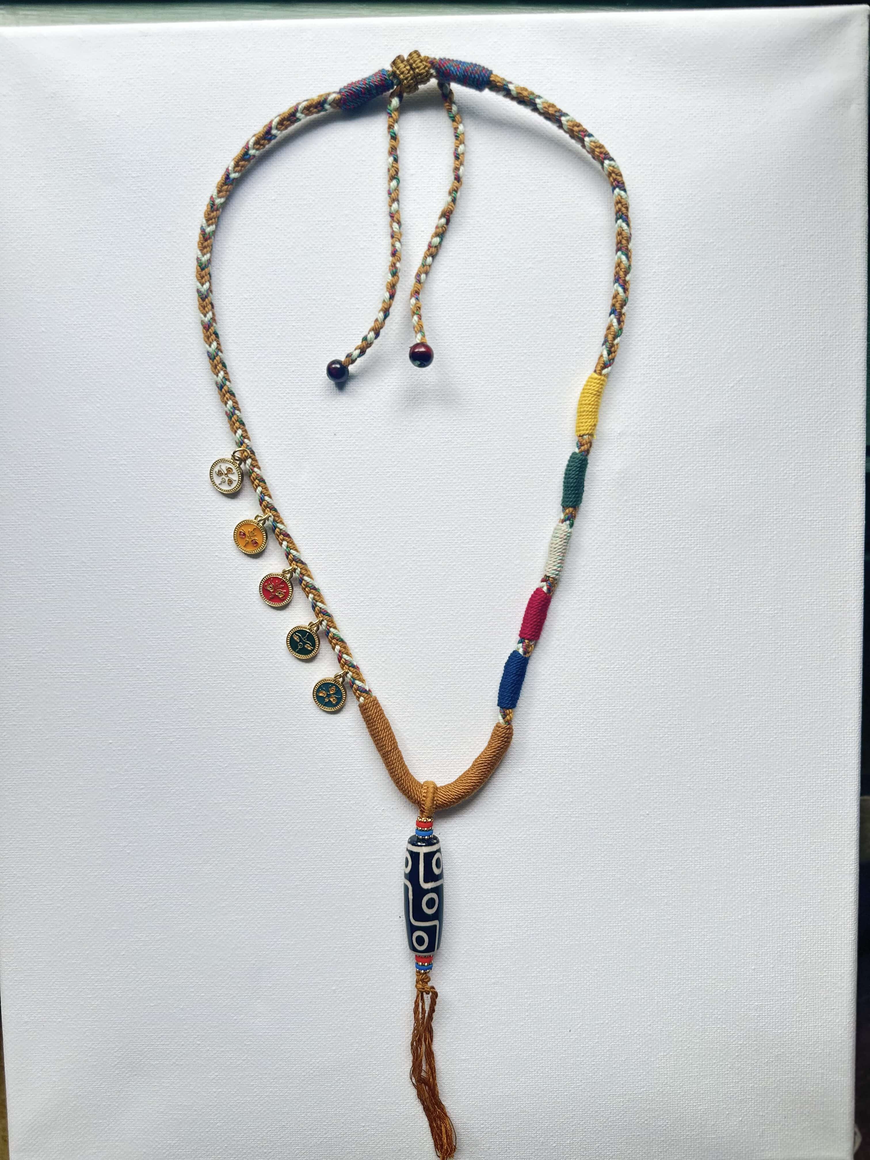 Heavily Handwoven Necklace with five metal lucky color plates and agate Nine-eyed DZI bead.