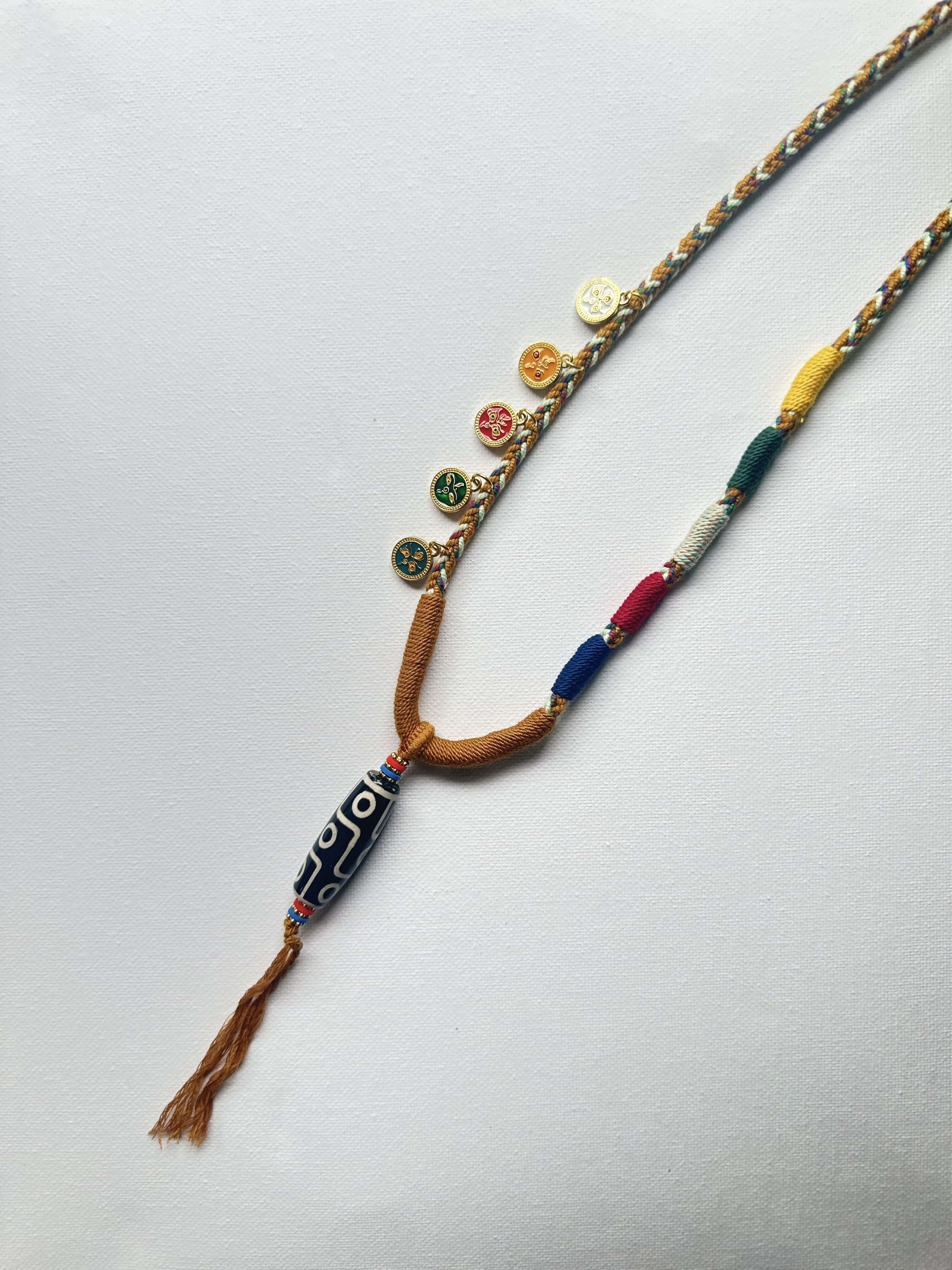 Heavily Handwoven Necklace with five metal lucky color plates and agate Nine-eyed DZI bead.