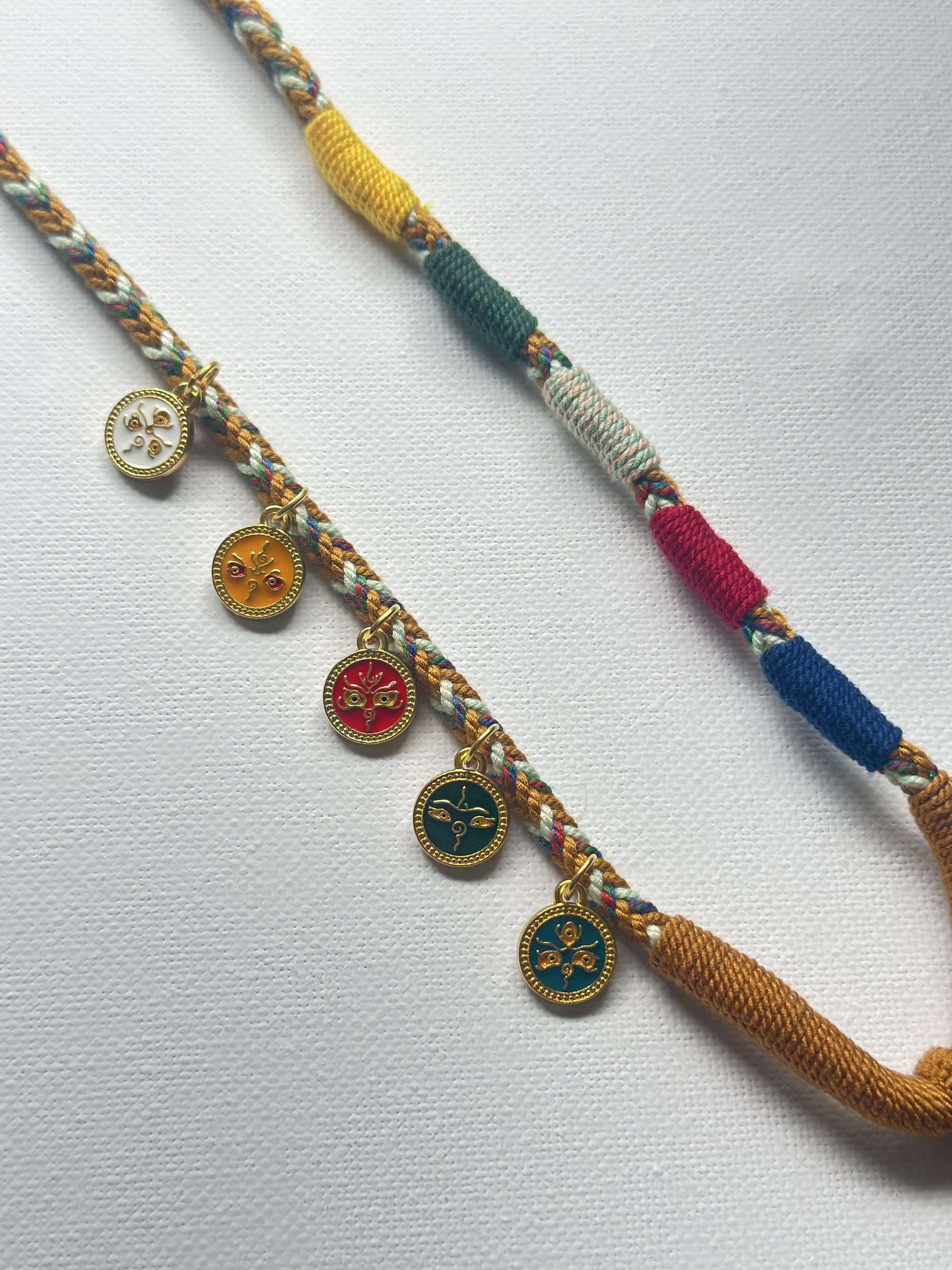 Heavily Handwoven Necklace with five metal lucky color plates and agate Nine-eyed DZI bead.