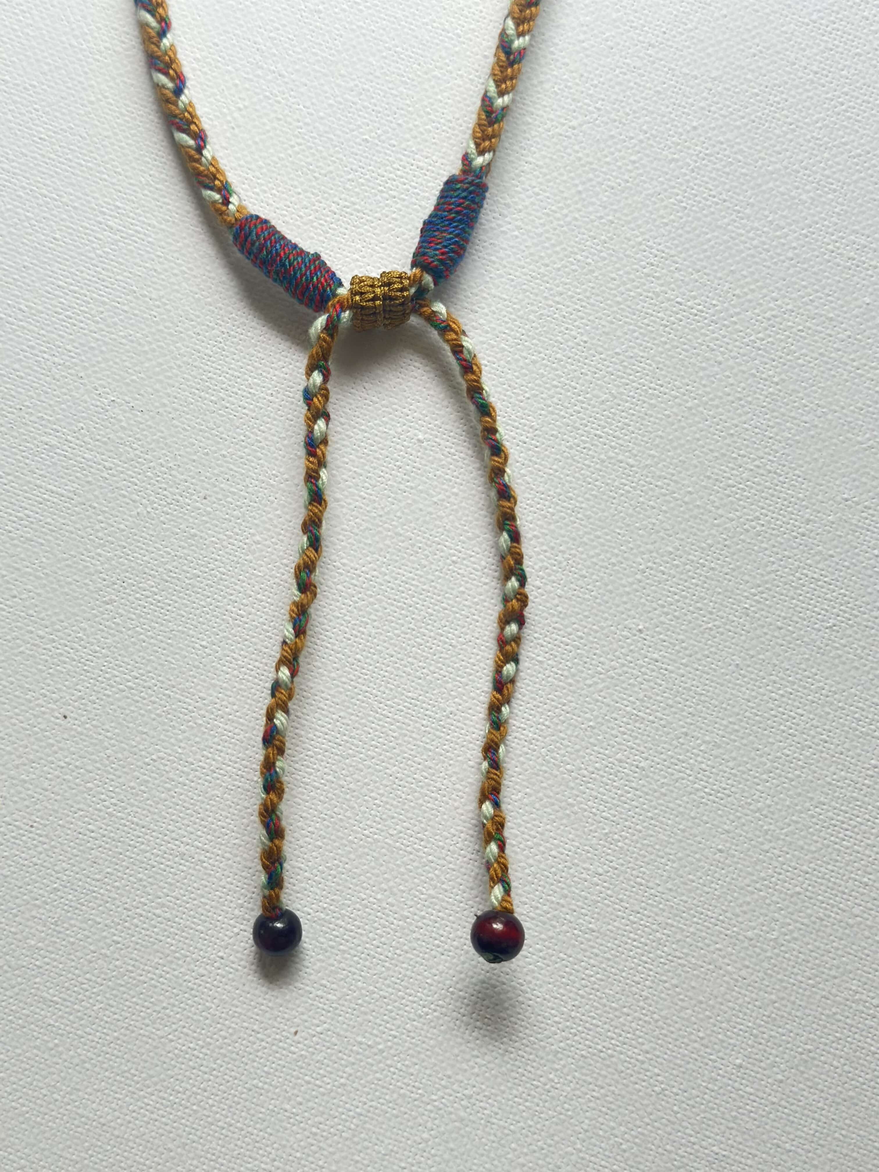 Heavily Handwoven Necklace with five metal lucky color plates and agate Nine-eyed DZI bead.