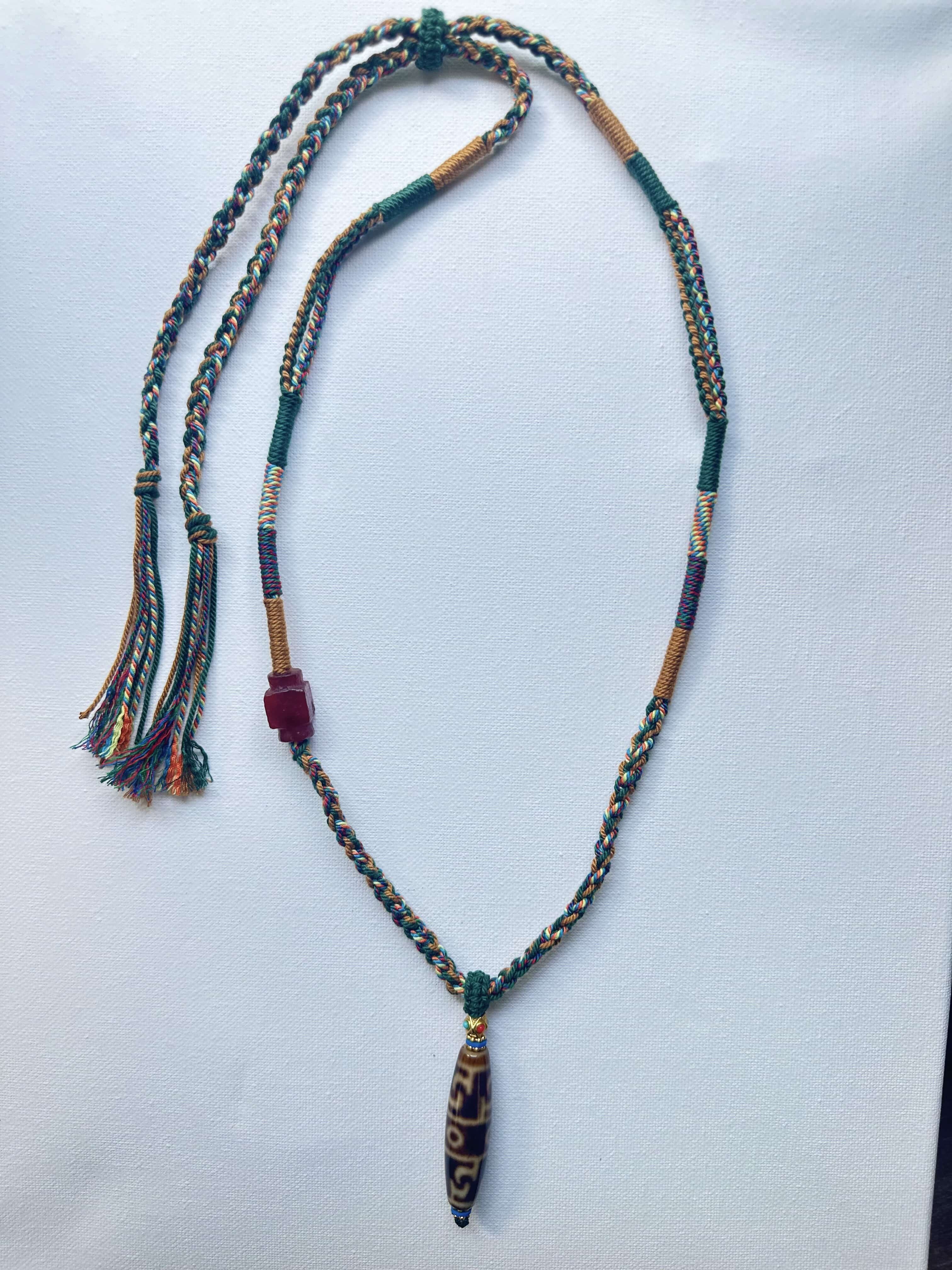 Heavily Handwoven Necklace with handmade carnelian bead and vintage Three-Eyed Dzi of Guru Rinpoche pendant.