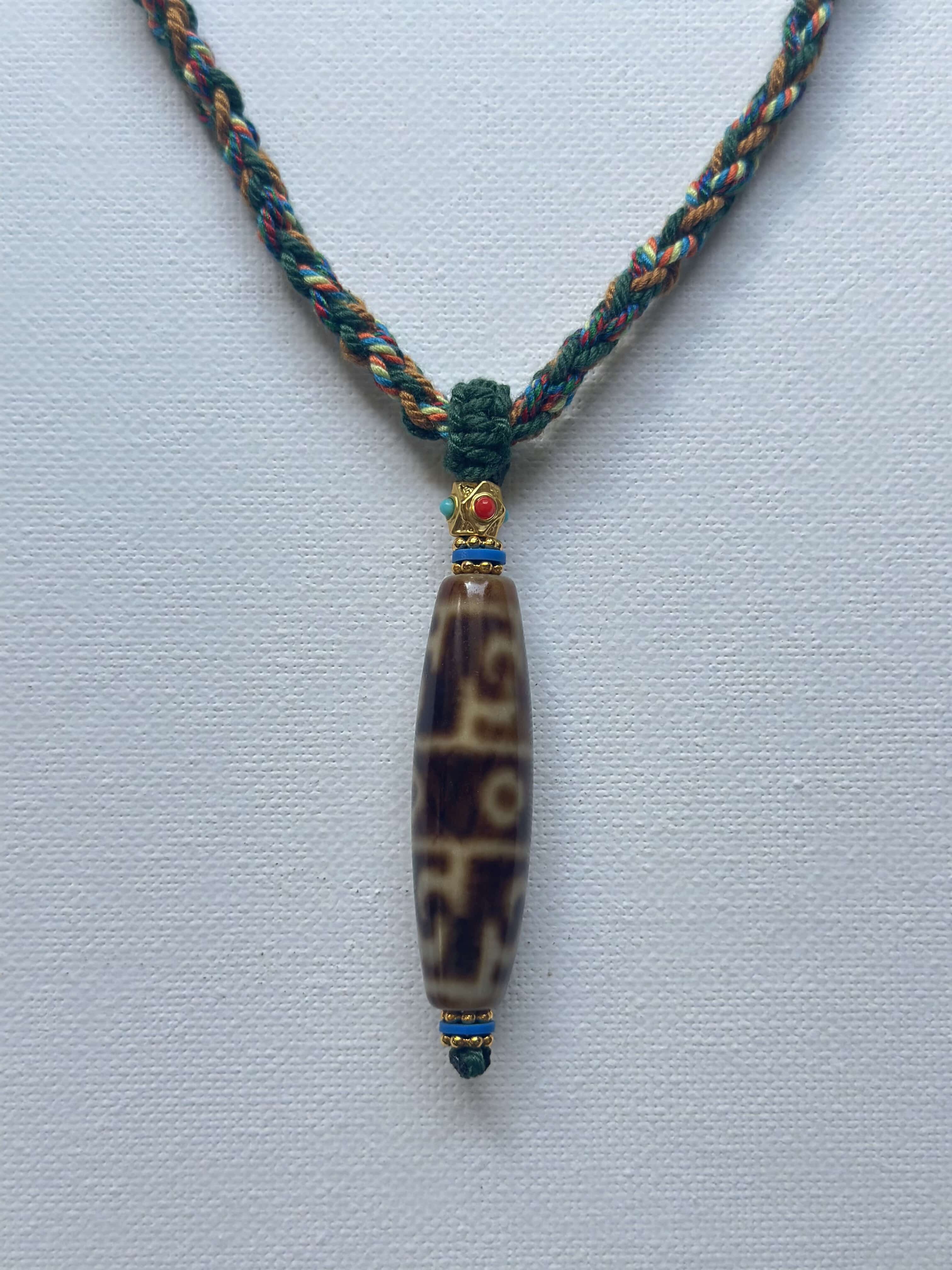 Heavily Handwoven Necklace with handmade carnelian bead and vintage Three-Eyed Dzi of Guru Rinpoche pendant.
