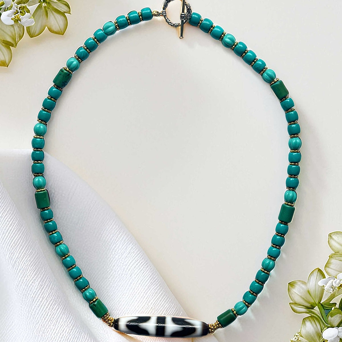 Handwoven necklace with green agate and Vintage Three-Eyed Dzi bead